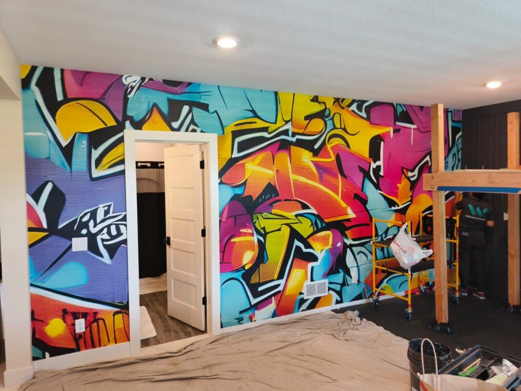 Colorful custom graffiti mural wallpaper installed in a Lebanon playroom